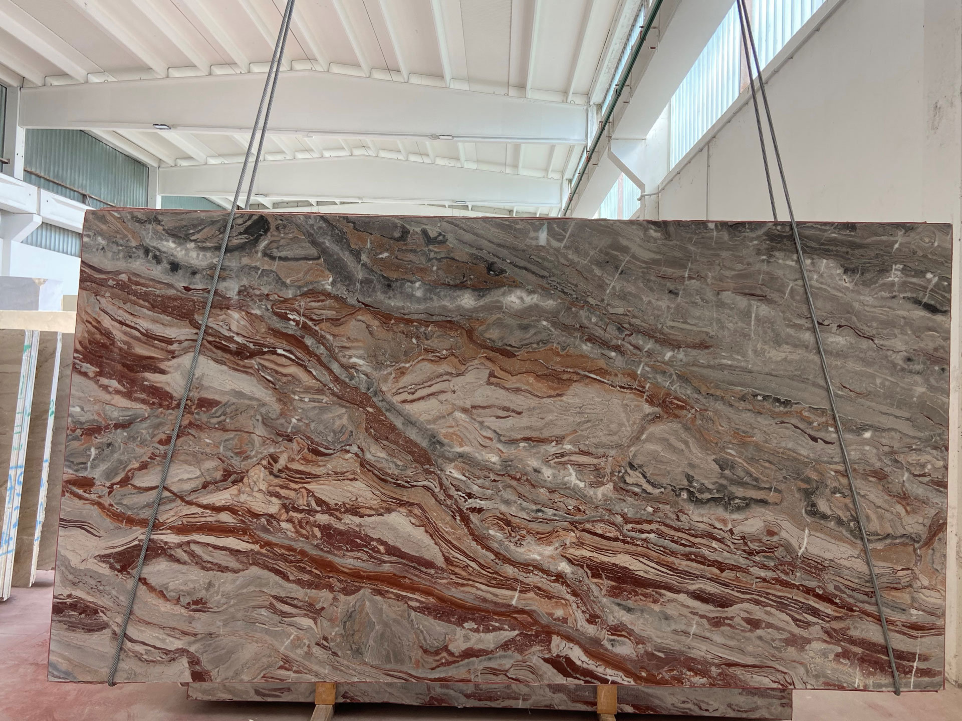 lazzarini marmi red orobico marble block