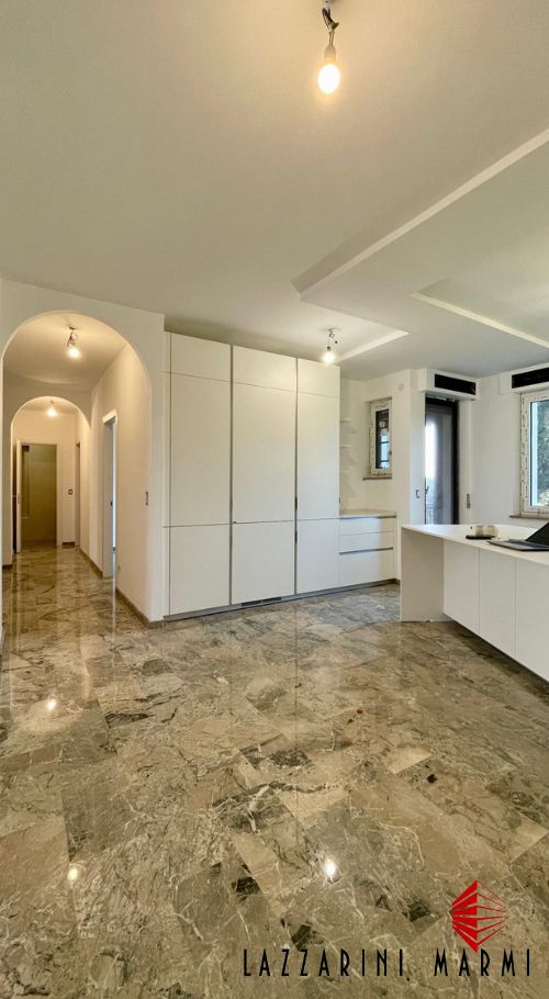 apartment floors in marble breccia blue by lazzarini marmi